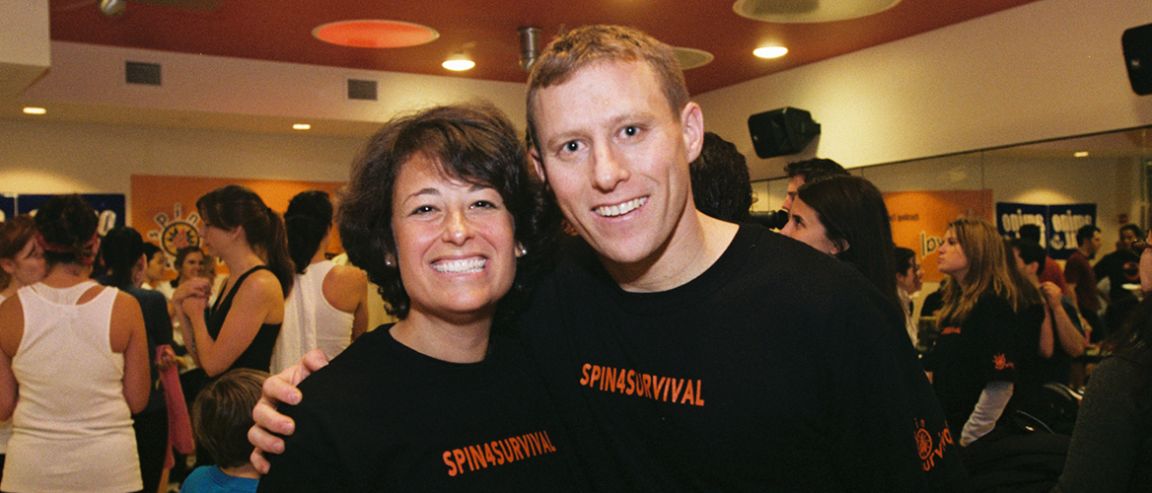 Cycle for Survival founders Jennifer Goodman Linn and Dave Linn, pictured in matching black Spin4Survival T-shirts, in 2007.